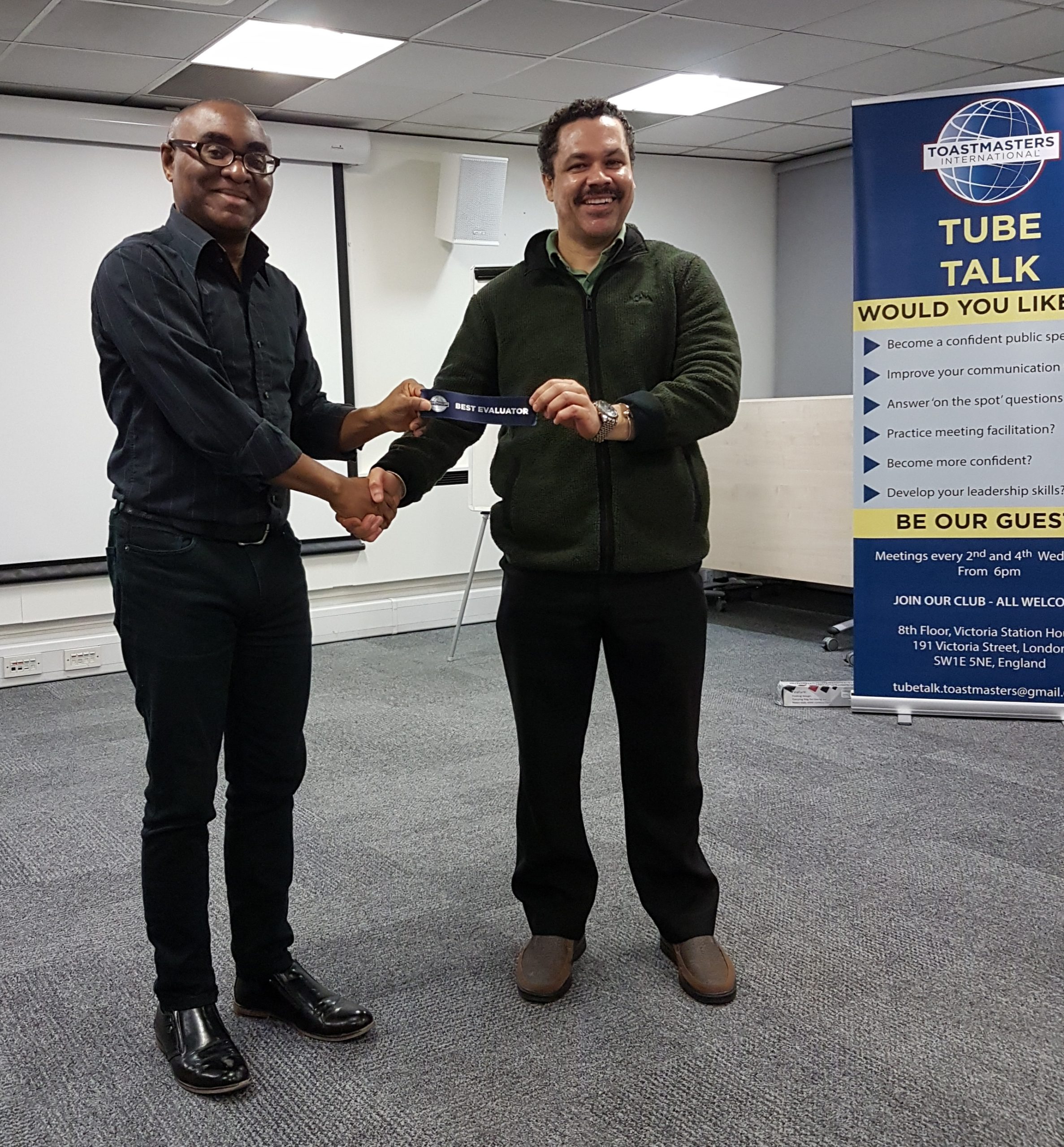 Tube Talk Toastmasters Club in London - presenting an award